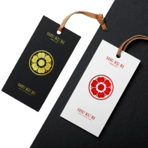 Custom printed brand tags featuring logo design UAE, perfect for garments, accessories, and boutique packaging.