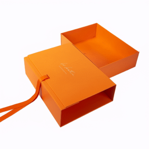 Premium hard cardboard orange box with magnetic closure and custom logo printing ideal for luxury gifting in Dubai & UAE.