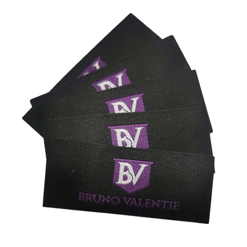 Custom woven labels featuring fine weaves and clean edges suitable for boutiques, tailors, and apparel brands.