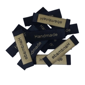 High-quality woven clothing labels with sharp thread detailing for retail garments, uniforms, and handmade products.