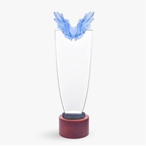 Crystal glass trophy with blue wings and wood base designed for corporate awards recognition events employee appreciation gifting UAE.