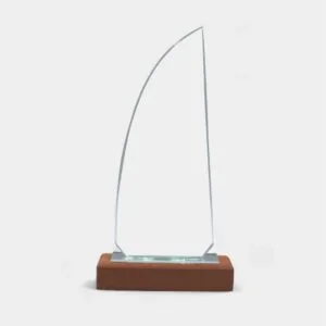 Sail shape crystal award trophy with wooden base designed for corporate awards recognition events appreciation gifts UAE.